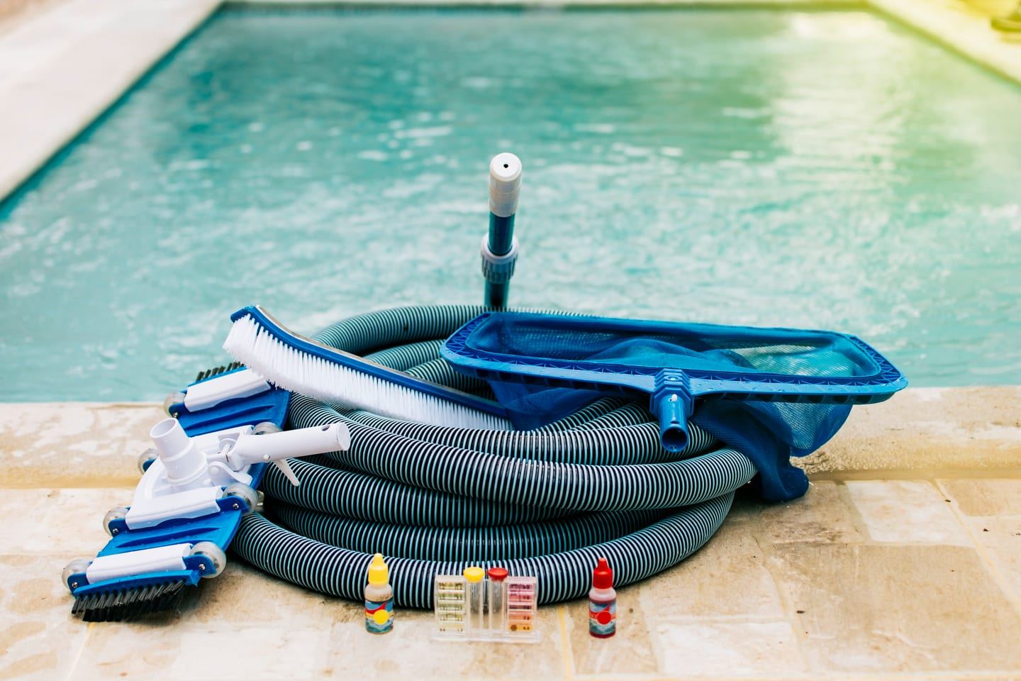 Pool service equipment and cleaning kit at the poolside
